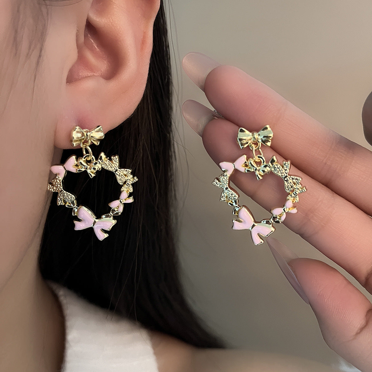 High-End Hollow Heart Bow Alloy Stud Earrings with Silver Plated Needles (TE04)